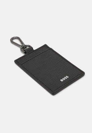 FIRST CLASS CROSSBODY UNISEX - Olkalaukku - black