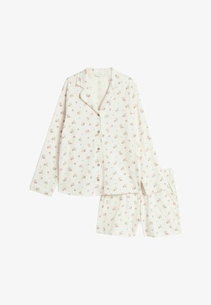 Kremowy komplet piżamy z długim rękawem zapinany na guziki i szortami, ozdobiony małym różowo-beżowym wzorem kwiatowym.