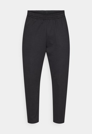 Pantalones deportivos negros con una cintura elástica, piernas estrechas y una textura suave. Adecuados para uso casual o deportivo.
