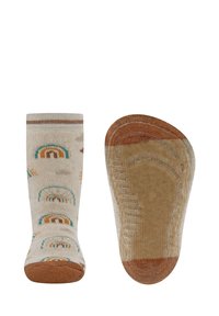Dziecięce skarpetki w beżowym kolorze z tęczowymi wzorami. Charakteryzują się strukturalną powierzchnią oraz brązowymi akcentami przy palcach i pięcie. Cuff z prążkowaną strukturą.