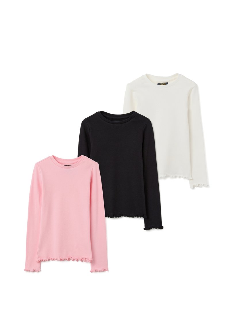 Drie shirts met lange mouwen in roze, zwart en wit. Voorzien van een geribbelde textuur met een gerimpelde zoom en manchetten. Rond halsontwerp.