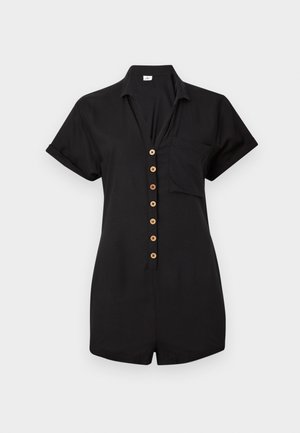 Black short-sleeve jumpsuit made of soft fabric, featuring a button-down front with wooden buttons and a chest pocket. Smooth texture.