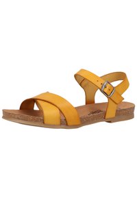 Gelbe Leder-Sandalen mit kreuzweise angeordneten Riemen, einer Schnallenverschluss, Korkinnensohle und flacher Gummisohle.
