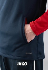 JAKO FUSSBALL - PERFORMANCE  - Felpa con cappuccio - blaurot