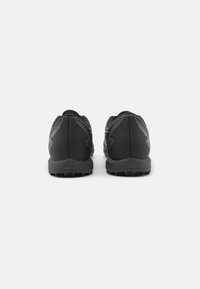 Puma Botines de fútbol para césped - black