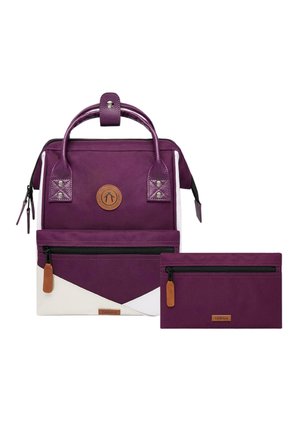 Purple canvas backpack with textured handle, front zipper pocket, and detachable purple pouch. Features a white and purple geometric pattern.