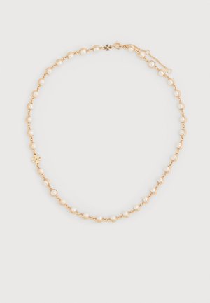 Collier en or composé de petits maillons en or alternant avec des perles blanches. Comprend un fermoir et une chaîne ajustable pour personnaliser la longueur.