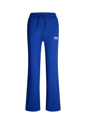 Pantaloni da jogging blu realizzati in un tessuto misto cotone. Presentano una cintura con cordoncino e un logo stampato sul lato sinistro. Design a gamba ampia.
