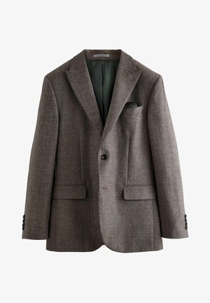 Sacou brown texturat cu rever ascuțit, închidere cu un singur nasture, două buzunare frontale și un buzunar pe piept cu un batic verde închis.