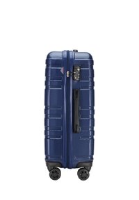 Valigia rigida blu navy con superficie texturizzata, manico telescopico, lucchetto a combinazione e 4 ruote girevoli per una facile mobilità.