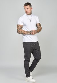 SIKSILK TAPERED FIT SMART - Träningsbyxor - black