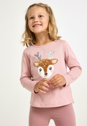 Rosa långärmad skjorta med en applikerad älgansikte och paljetterad horn. Matchas med rosa leggings i mjuk tygkvalitet.