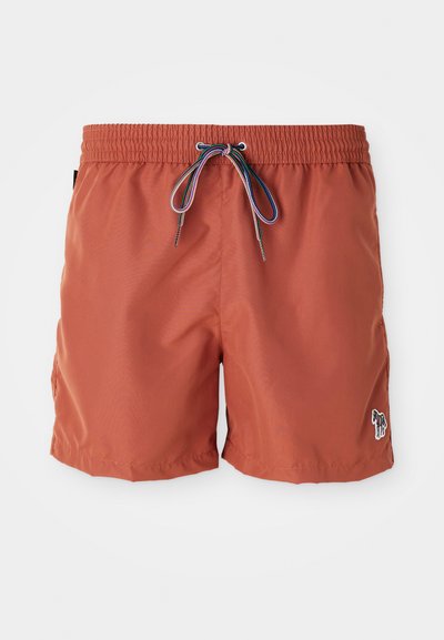 Shorts de bain pour homme en couleur rouille, avec une taille élastique dotée d'un cordon de serrage, des poches latérales et un petit logo zèbre en bas à droite.