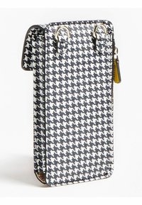 Houndstooth-mönstrad, svart och vit telefonficka gjord av syntetiskt material. Har två metallringar och ett dragkedjestängning på ena sidan.