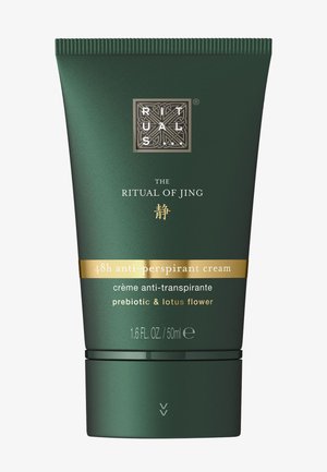 Tube vert foncé de crème anti-transpirante Ritual of Jing 48h avec prébiotique et fleur de lotus, 50 ml, avec logo de la marque en haut.