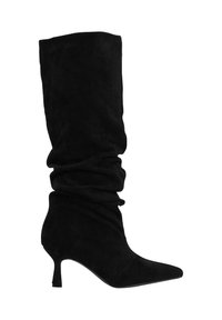 Botte haute en suède noir, tige souple, bout pointu et talon moyen fin.