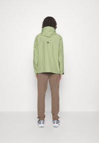 Nike Sportswear Casaco impermeável - alligator sail