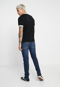 Levi's® 512™ SLIM TAPER - Calças de ganga justas - sage overt