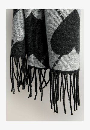 Black and gray woven wool scarf with large heart patterns, finished with long, twisted fringe edges and a soft texture.