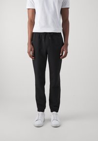 Calvin Klein Jeans TECHNICAL BADGE PANT - Joggebukse - black
