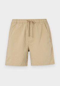 Beige shorts made of cotton with an elastic waistband, drawstring, and side pockets. Smooth texture and above-the-knee length.