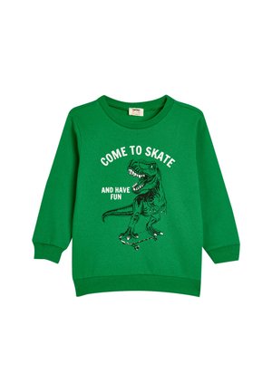 Zielona bluza z bawełny, z długimi rękawami i okrągłym dekoltem. Na przodzie grafika przedstawiająca dynozaura na deskorolce z napisem.