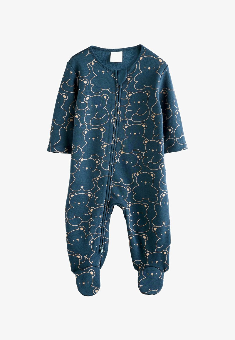 Grenouillère bébé bleu foncé avec des contours d'ours en peluche beige, manches longues, jambes avec pieds et fermeture éclair à l'avant.