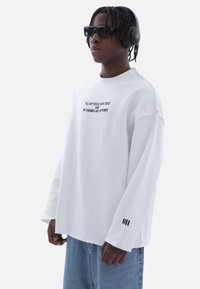 Megaman Sweatshirt - weiß