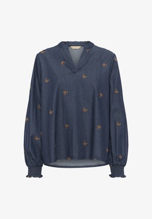 Denimpluus pikkade varudega, V-kaelusega, elastsete mansettidega ja kuldsete liblikate tikandiga tumeda sinise kanga peal.