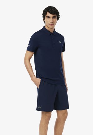 SPORT HOMME - Pantalón corto de deporte - bleu marine blanc