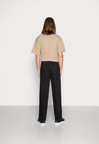 Weekday ROSS WIDE TROUSERS - Chinos - black