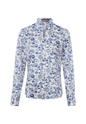 Witte blouse met lange mouwen, knoopsluiting, blauw bloemenpatroon, opstaande kraag en getailleerde pasvorm.
