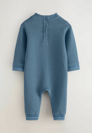 Mono de textura de gofre azul con mangas largas, cierre de tres botones en el cuello y puños a rayas. Adecuado para bebés o niños pequeños.