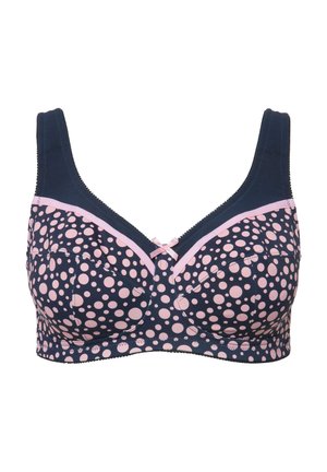 Soutien-gorge bleu marine à pois roses avec larges bretelles, texture douce et un nœud décoratif au centre. Présente des bordures contrastantes et une conception soutenante.
