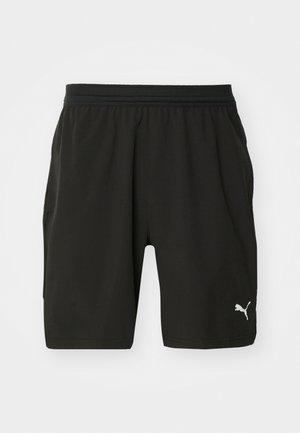 Svarta träningsshorts gjorda av lättviktsmaterial med elastisk midjeband, med två fickor på sidan och en liten vit logotyp på den nedre framsidan.