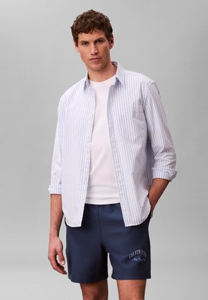 - Spodnie treningowe