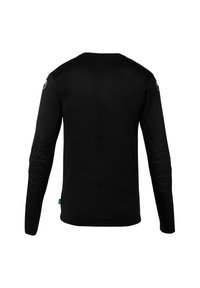 Chemise noire à manches longues avec des accents de coudières rembourrées texturées et un col rond. Tissu lisse avec un léger brillant.