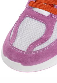 Purple suede sneaker featuring white mesh panels, orange laces, and white rubber sole with pink accents. Detailed stitching evident.