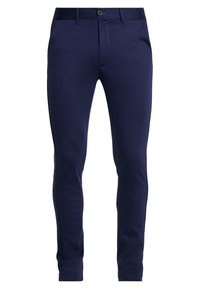 Námořnické slim-fit kalhoty vyrobené z hladké tkaniny, se zipem, zapínáním na knoflík a předními kapsami. Přizpůsobený design pro upravený vzhled.