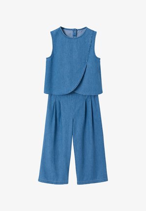 Sleeveless blue denim top with asymmetrical front overlay and matching wide-leg cropped pants with pleats.