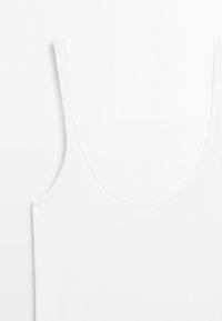 White sleeveless tank top with thin shoulder straps and a low scoop neckline on a plain background.