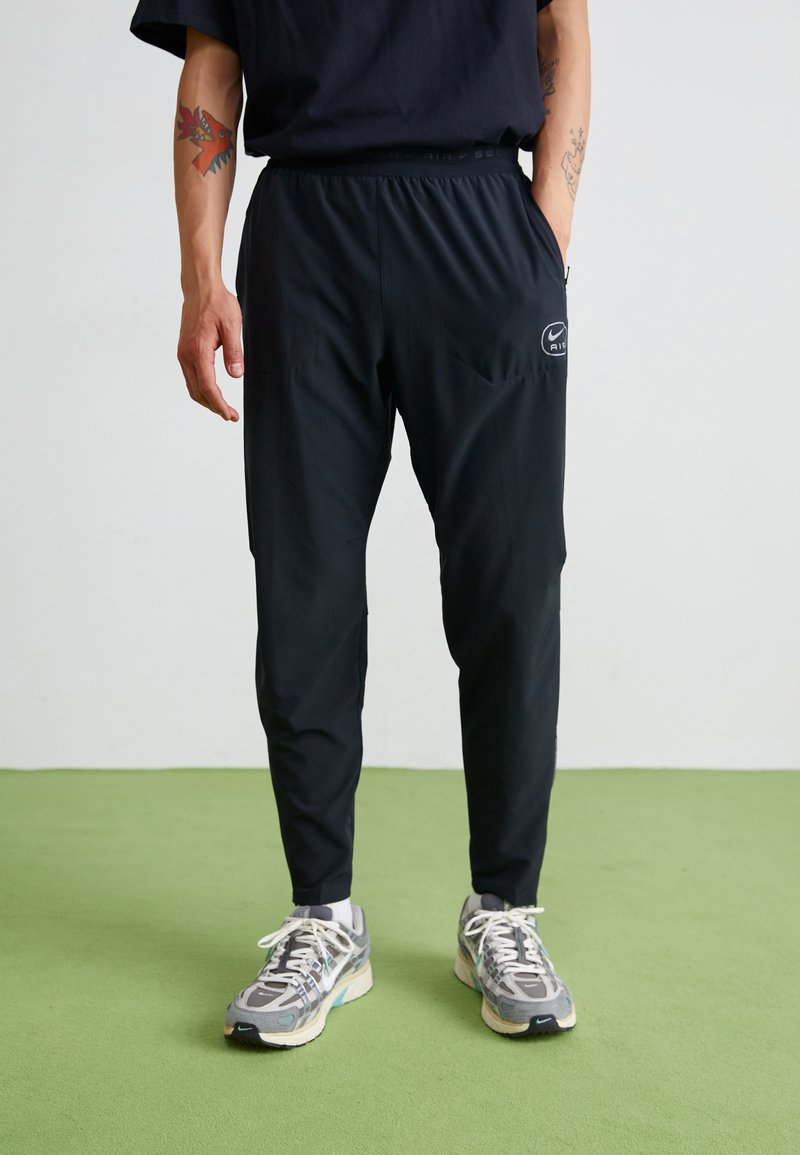 Nike Sportswear AIR RUN PANT - Donji dijelovi trenirke - black/reflective silver