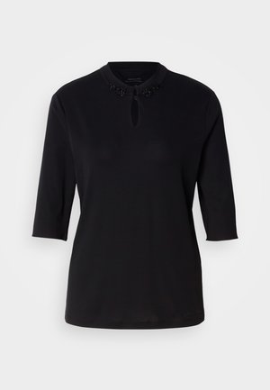 Black 3/4 sleeve top with a round neckline and keyhole detail, featuring a beaded floral design around the collar. Soft fabric, smooth texture.
