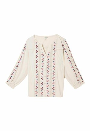 Cream blouse with long sleeves, button front, and vertical floral embroidery in red and blue along front and sleeves.