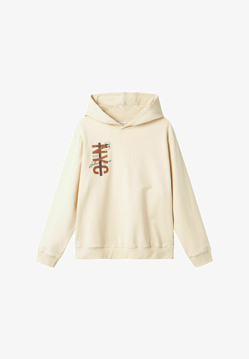 Sudadera de color crema con una textura suave, que presenta un gran estampado gráfico en marrón y negro en la parte delantera y una capucha con cordones.
