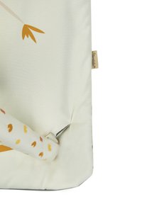 Canvas tote bag in cream with a yellow feather design. Features a patterned strap in orange and brown hues, with a zipper detail.