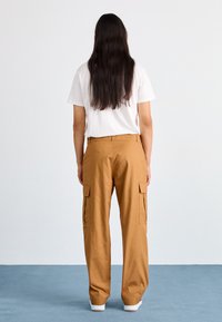 Champion Rochester SKATE STREET - Calças cargo - beige, brown