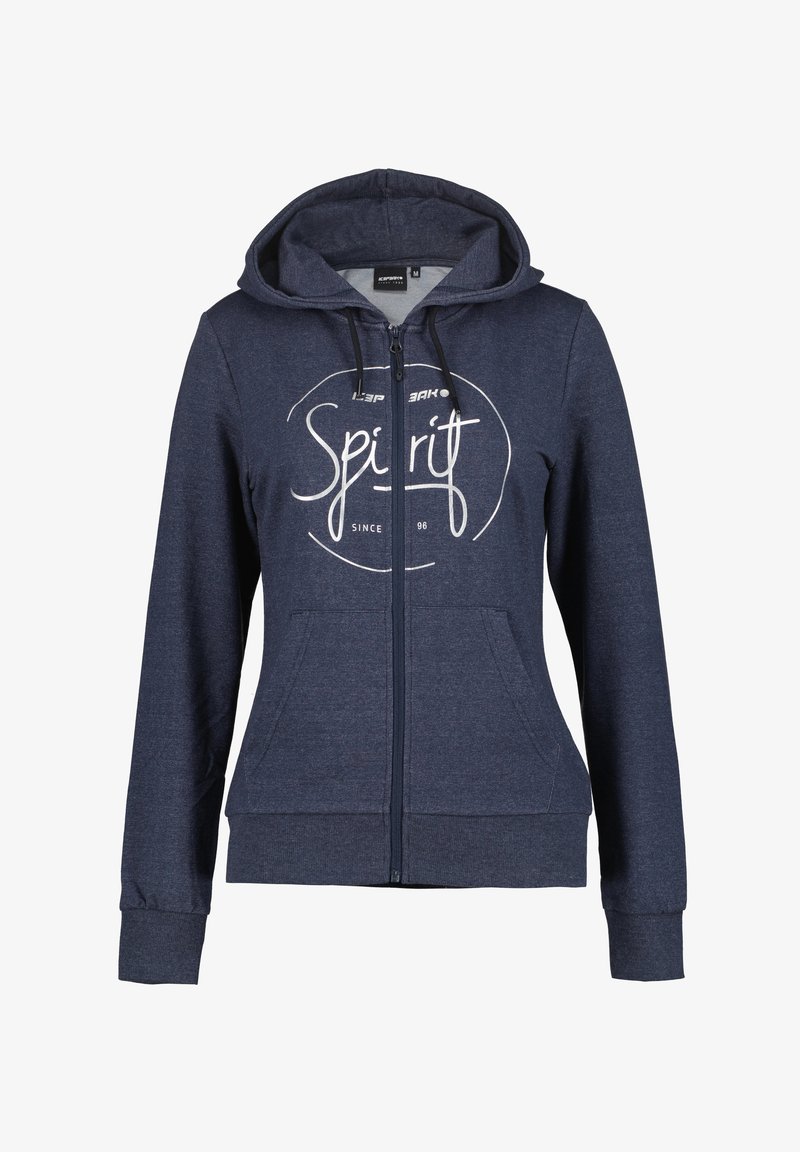 Marineblauwe zip-up hoodie gemaakt van zachte stof met een trekkoordcapuchon, voorzien van een witte grafische tekst "Spirit since 96" op de voorkant en twee zijzakken.
