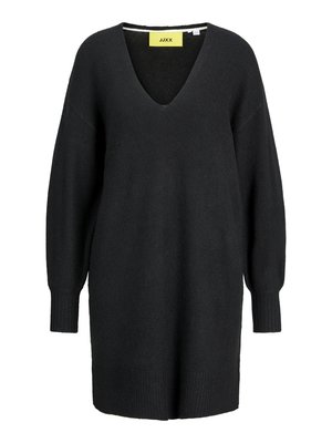 Svart oversized tröja klänning med djup V-hals, lång ärm och ribbad nederkant. Tillverkad av mjukt, texturerat tyg. Lappen synlig vid halsringningen.