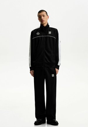 Tracksuit bottoms - black